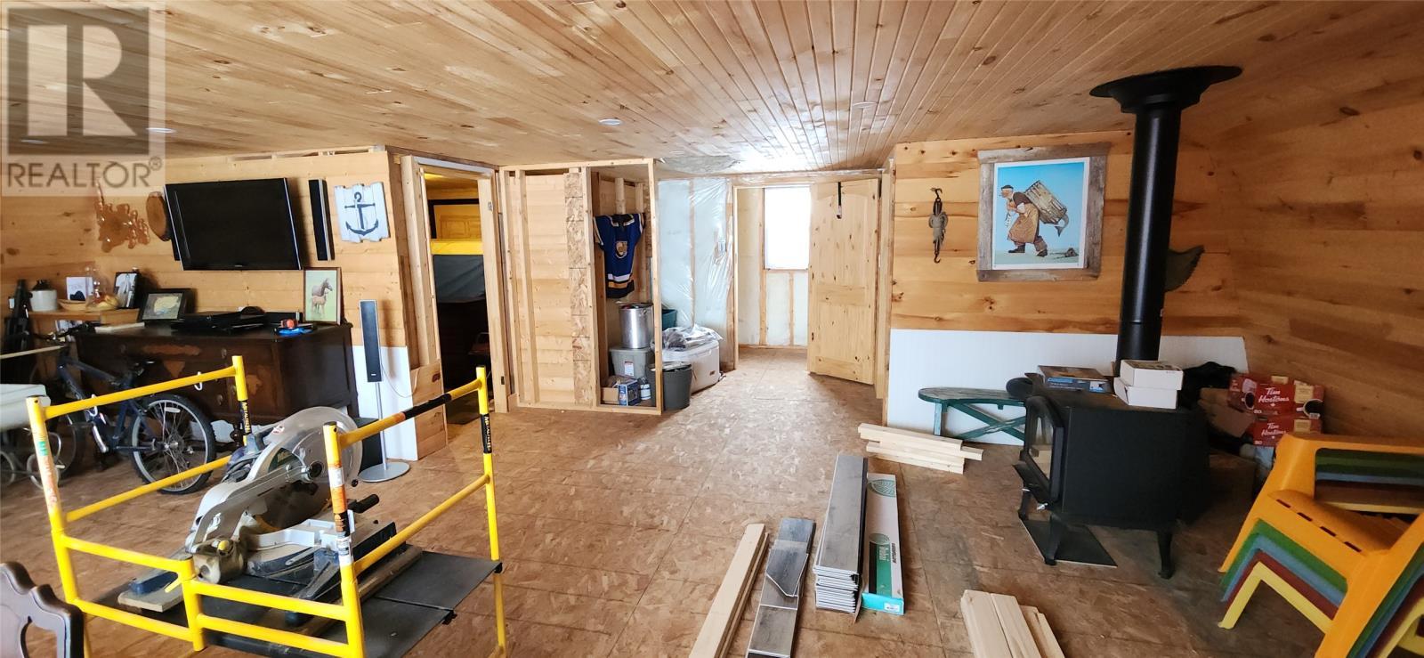 Large Garage Loft with woodstove above a double garage 28 x 30 - 15 Squires Road, Eastport, NL - Indoor