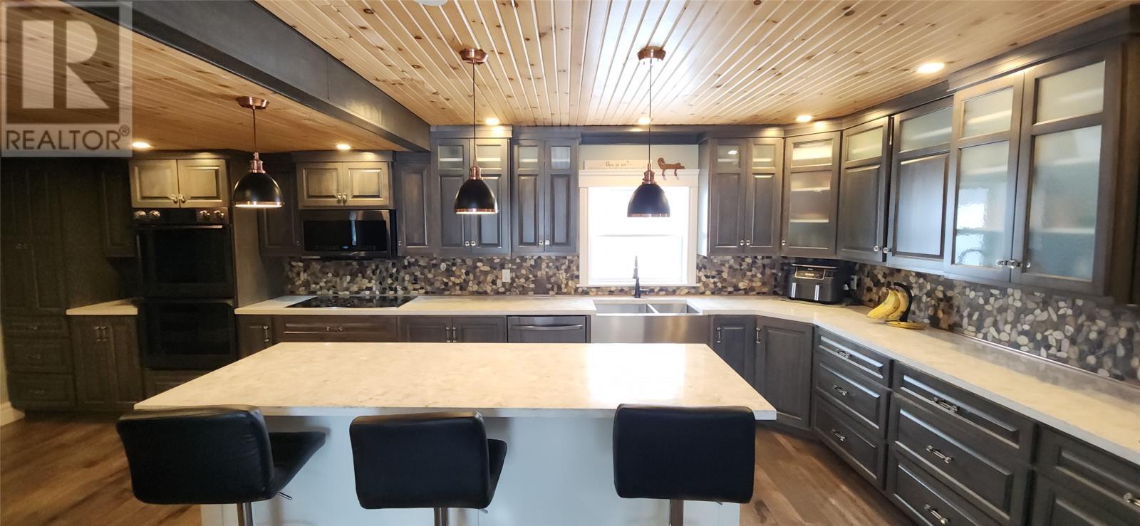 Fantastic Kitchen with quality appliances and quartz tops - 15 Squires Road, Eastport, NL - Indoor Photo Showing Kitchen With Double Sink With Upgraded Kitchen