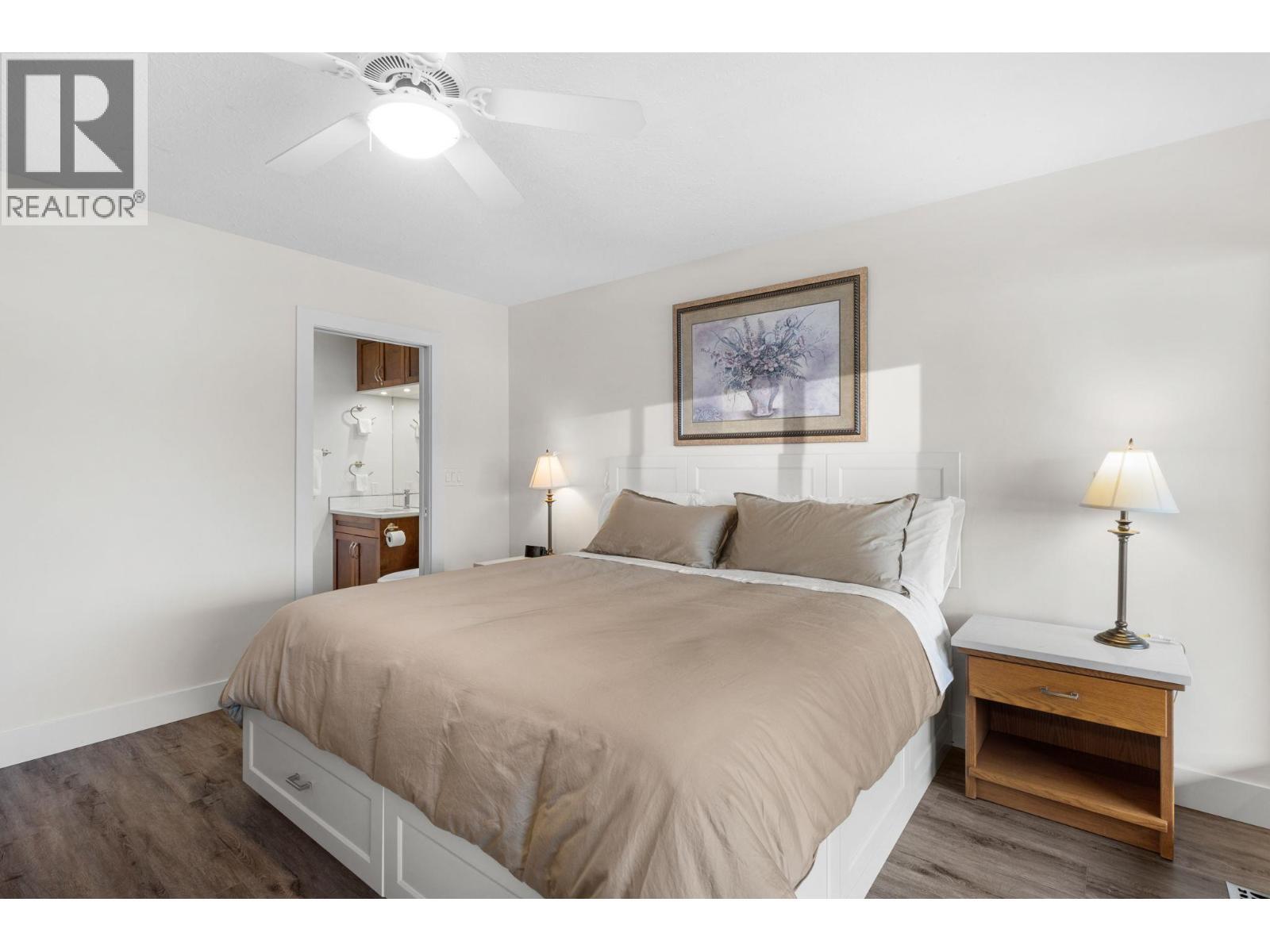 2nd Floor Primary bedroom and ensuite with private deck. - 2777 Casa Loma Road Unit# 207, West Kelowna, BC - Indoor Photo Showing Bedroom