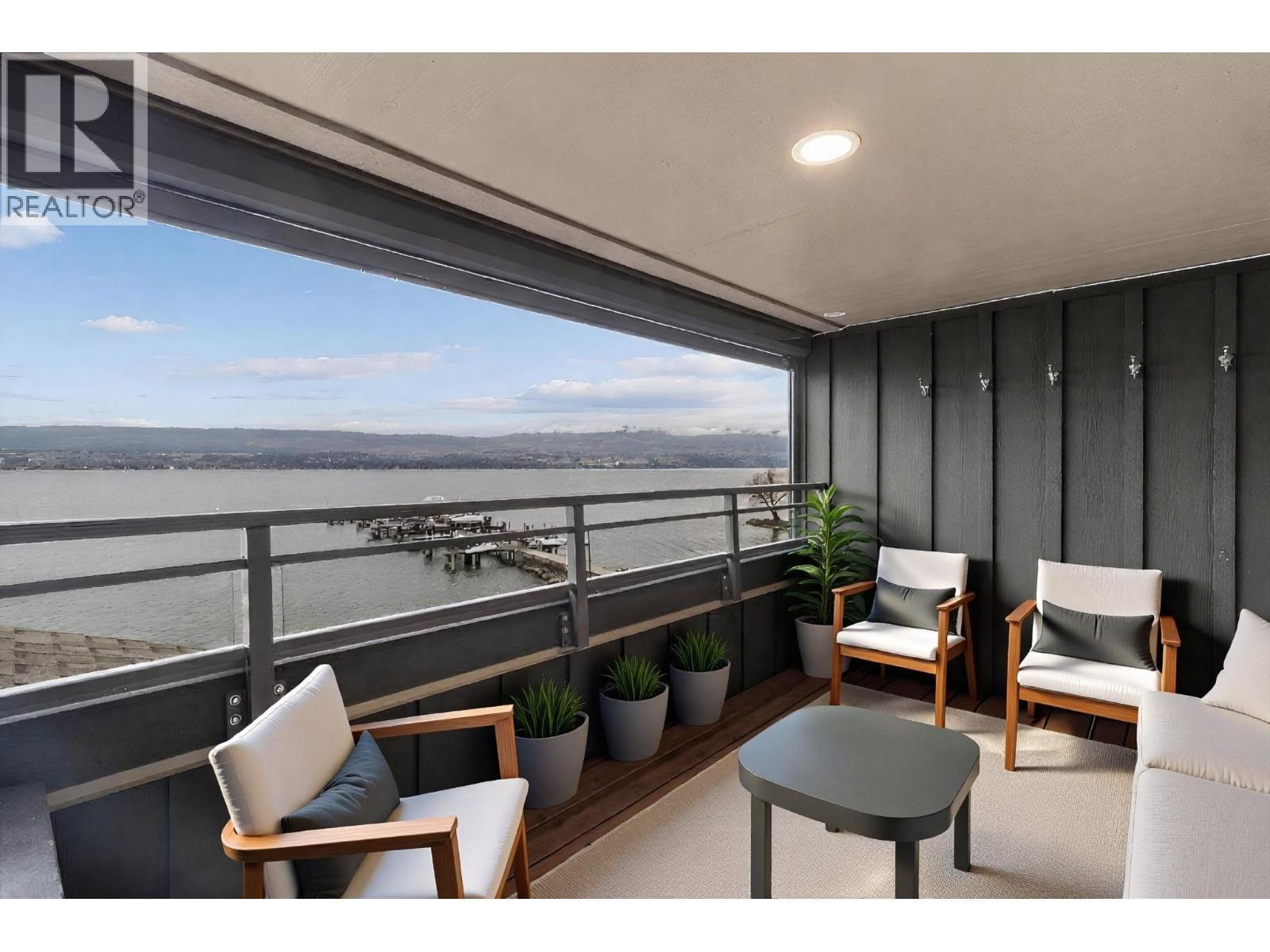 Primary suite private deck, virtually staged - 2777 Casa Loma Road Unit# 207, West Kelowna, BC - With Body Of Water With Exterior