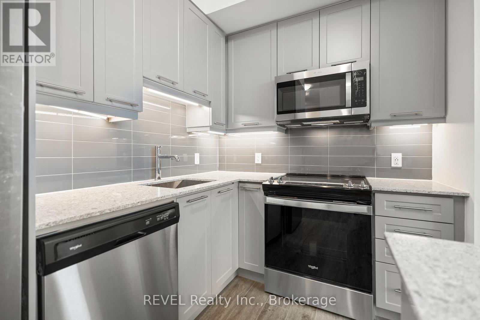 1907 - 385 Winston Road, Grimsby (Grimsby Beach), ON - Indoor Photo Showing Kitchen With Stainless Steel Kitchen With Upgraded Kitchen