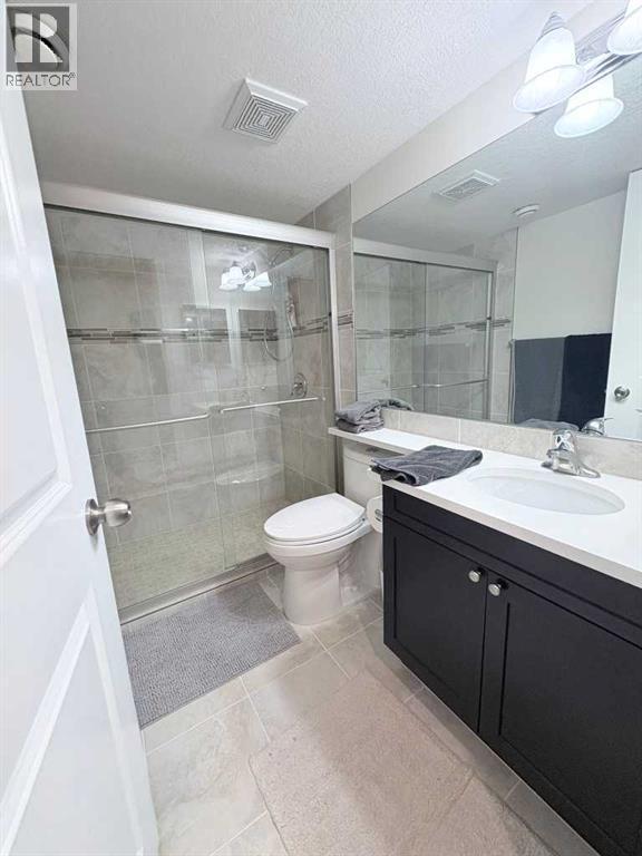 36 Evansborough Common Nw, Calgary, AB - Indoor Photo Showing Bathroom