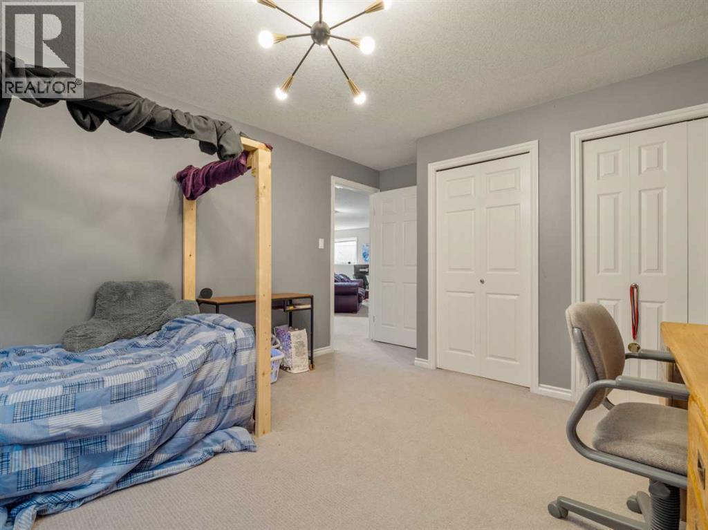 47 Kodiak Boulevard N, Lethbridge, AB - Indoor Photo Showing Bedroom