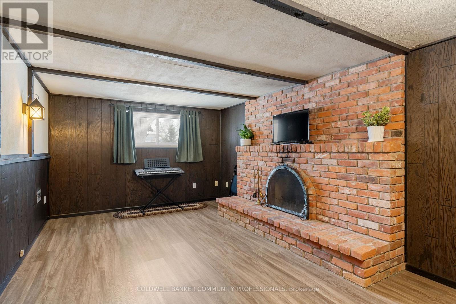 401 Mohawk Road W, Hamilton, ON - Indoor With Fireplace
