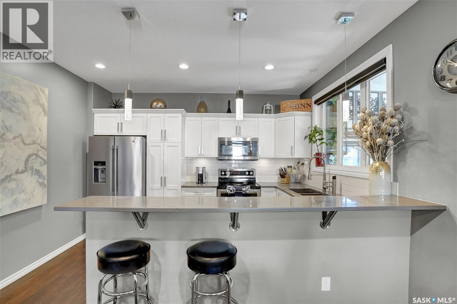 25 Hudson Drive, Pilot Butte, SK - Indoor Photo Showing Kitchen With Upgraded Kitchen