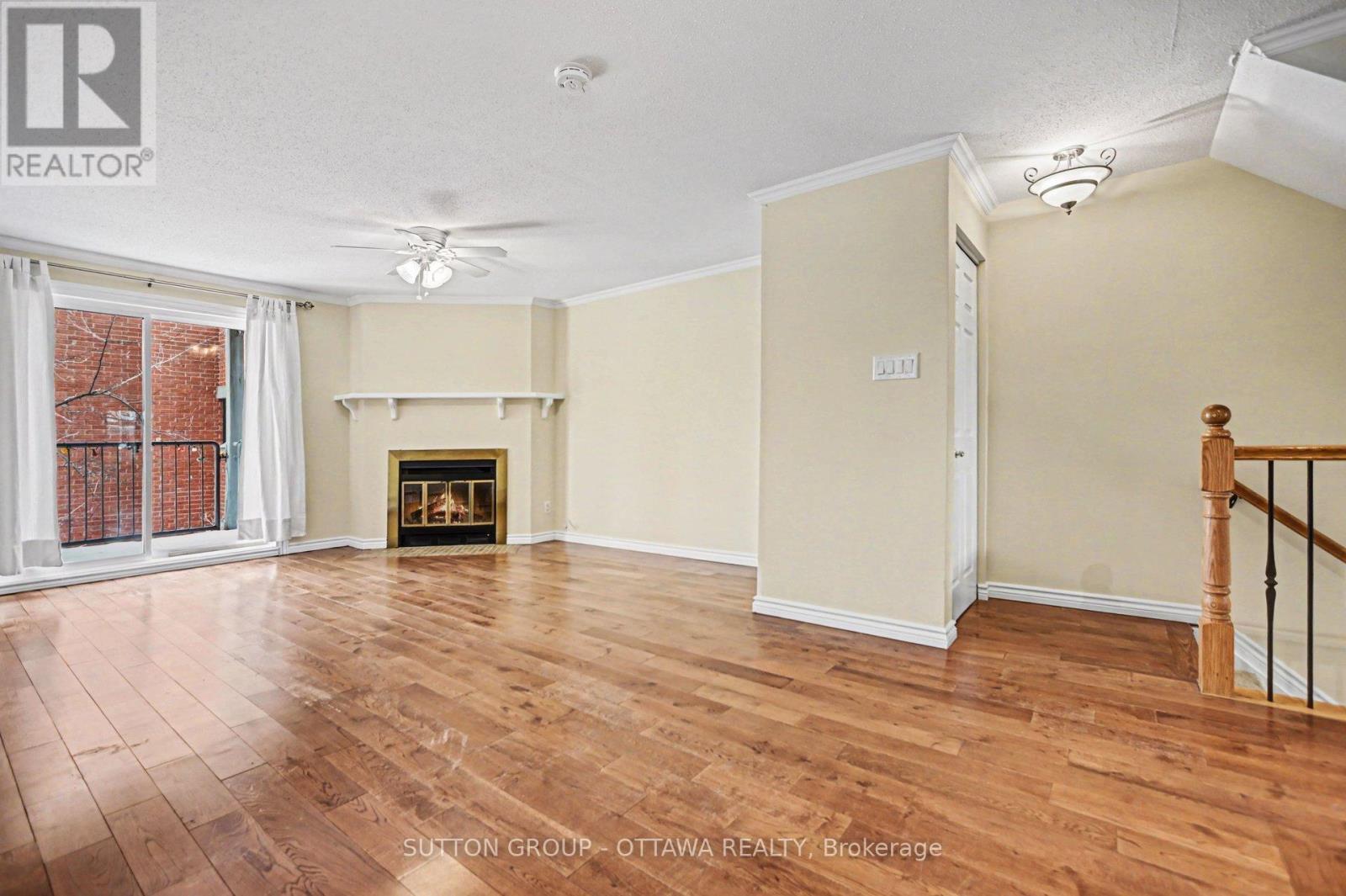 Living Room - 207 Mart Circle, Ottawa, ON - Indoor Photo Showing Living Room With Fireplace
