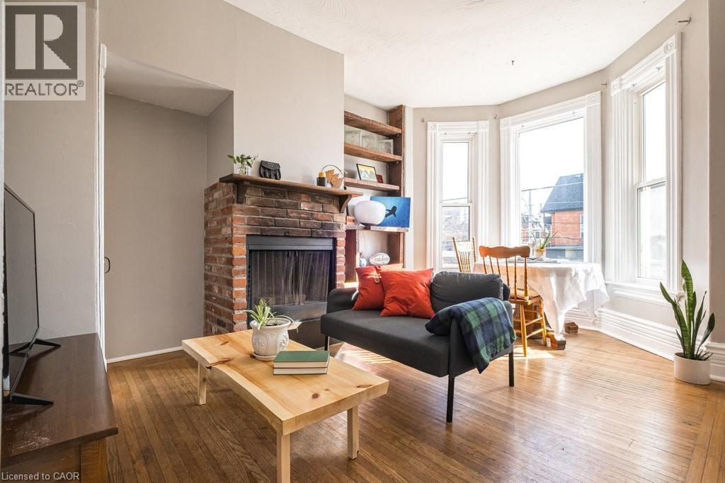270 Queen Street S Unit# 2, Hamilton, ON - Indoor Photo Showing Living Room With Fireplace