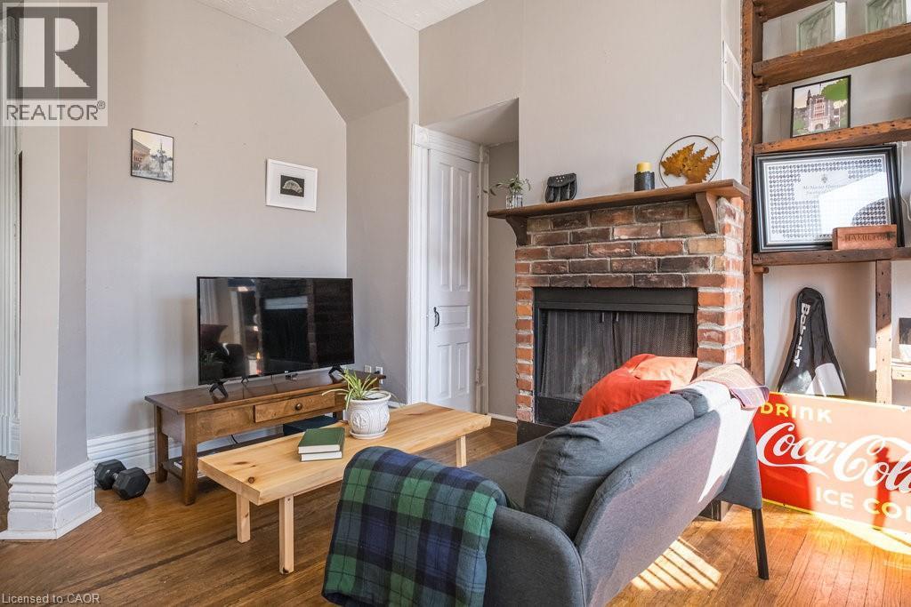 270 Queen Street S Unit# 2, Hamilton, ON - Indoor Photo Showing Living Room With Fireplace