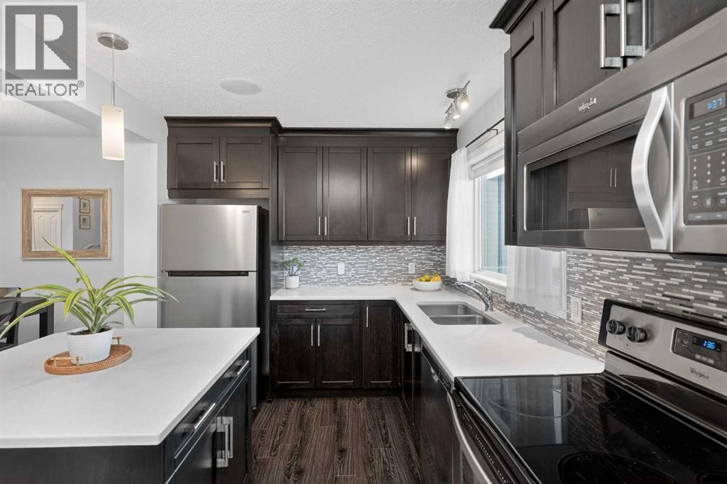 61 Auburn Meadows View Se, Calgary, AB - Indoor Photo Showing Kitchen With Stainless Steel Kitchen With Double Sink With Upgraded Kitchen