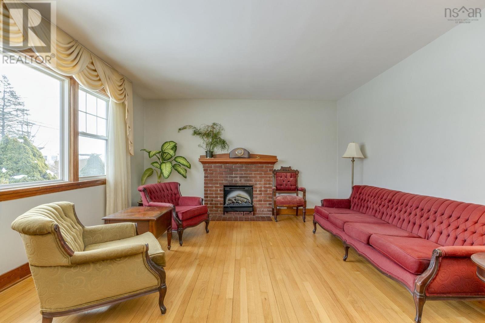 24 Penhorn Drive, Dartmouth, NS - Indoor Photo Showing Living Room With Fireplace