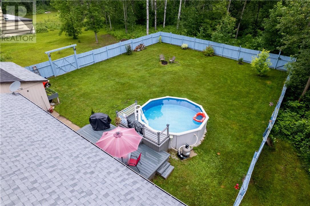 62 Highway 17 E, Spanish, ON - Outdoor With Above Ground Pool With Backyard