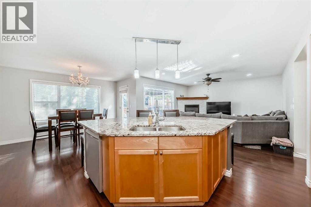 574 Chaparral Drive Se, Calgary, AB - Indoor Photo Showing Kitchen With Double Sink