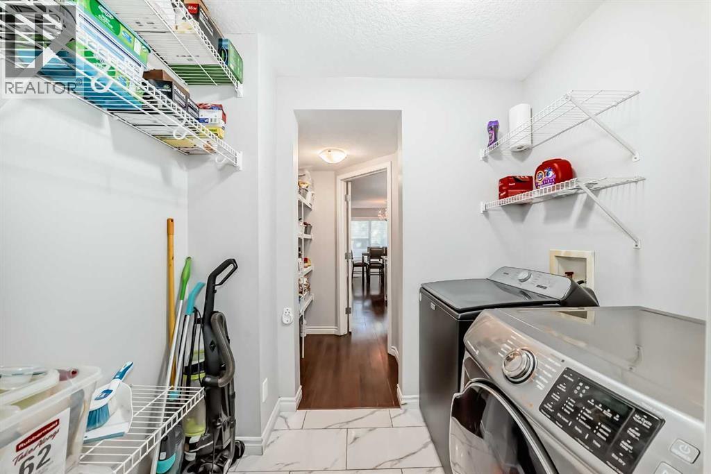 574 Chaparral Drive Se, Calgary, AB - Indoor Photo Showing Laundry Room