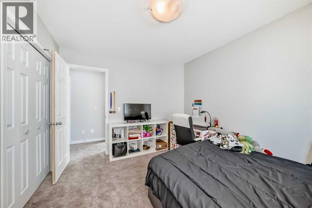 574 Chaparral Drive Se, Calgary, AB - Indoor Photo Showing Bedroom