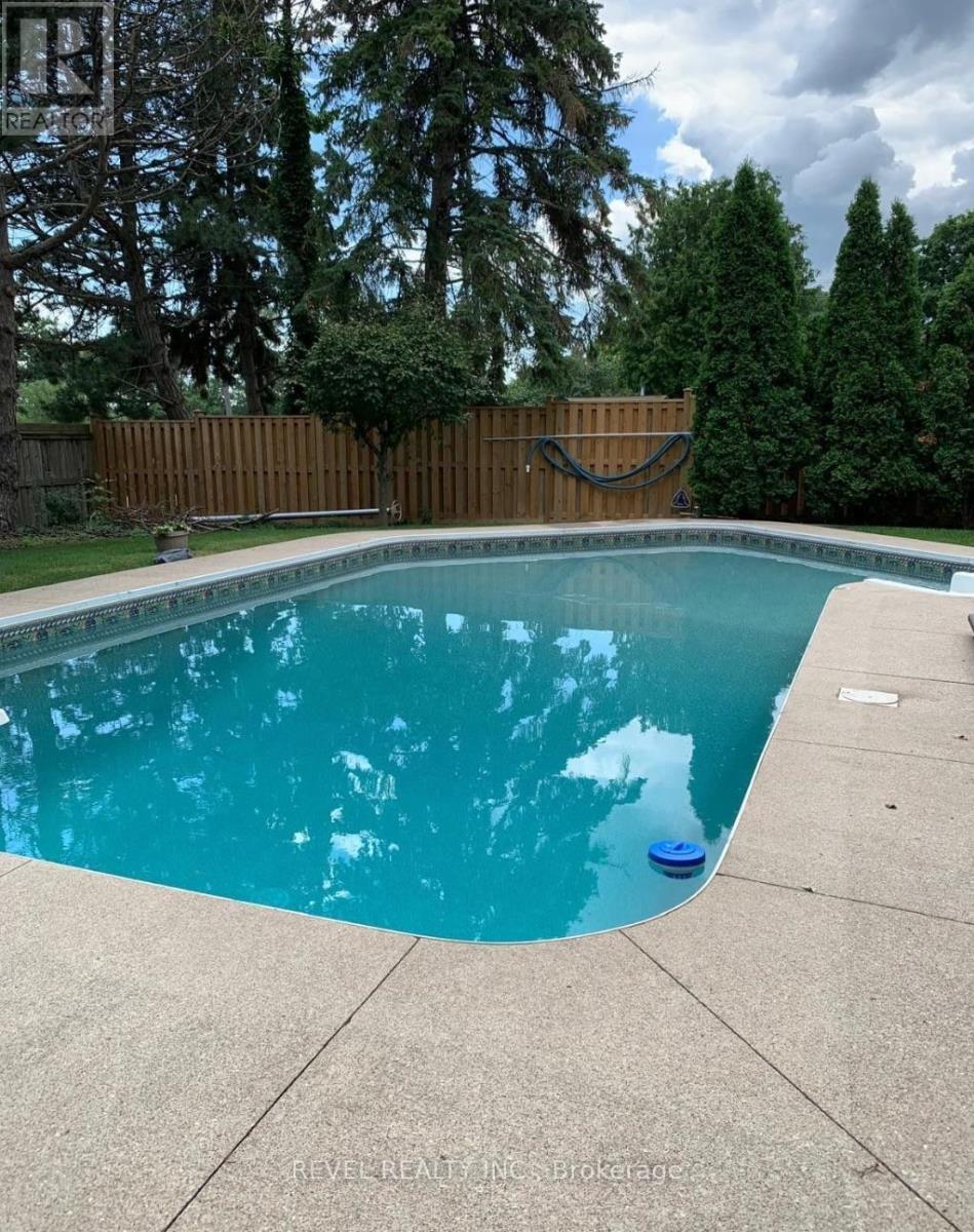 1034 Fredonia Drive, Mississauga, ON - Outdoor With In Ground Pool With Backyard