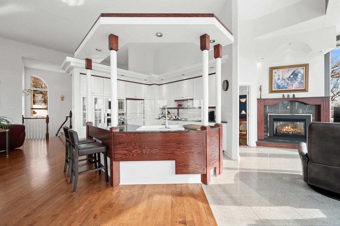 Kitchen - 1455 Rue Des Quatre-Saisons, Sainte-Adèle, QC - Indoor With Fireplace