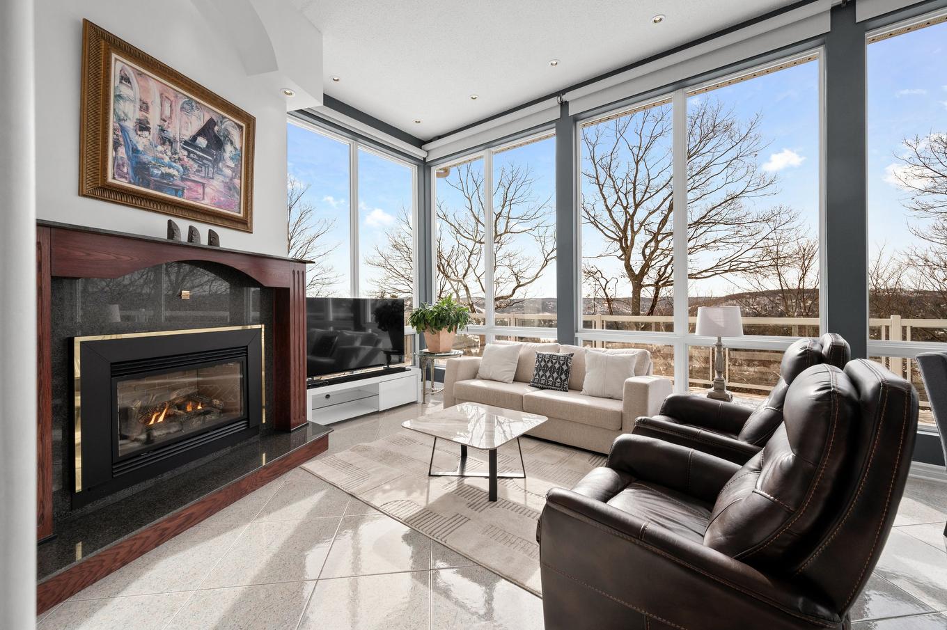 Den - 1455 Rue Des Quatre-Saisons, Sainte-Adèle, QC - Indoor Photo Showing Living Room With Fireplace
