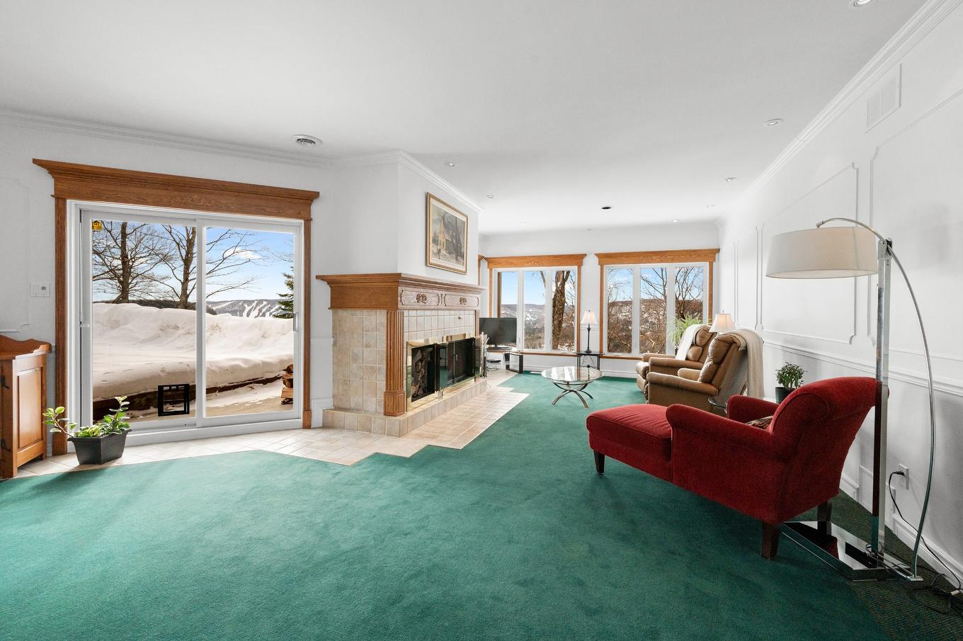 Family room - 1455 Rue Des Quatre-Saisons, Sainte-Adèle, QC - Indoor Photo Showing Other Room With Fireplace