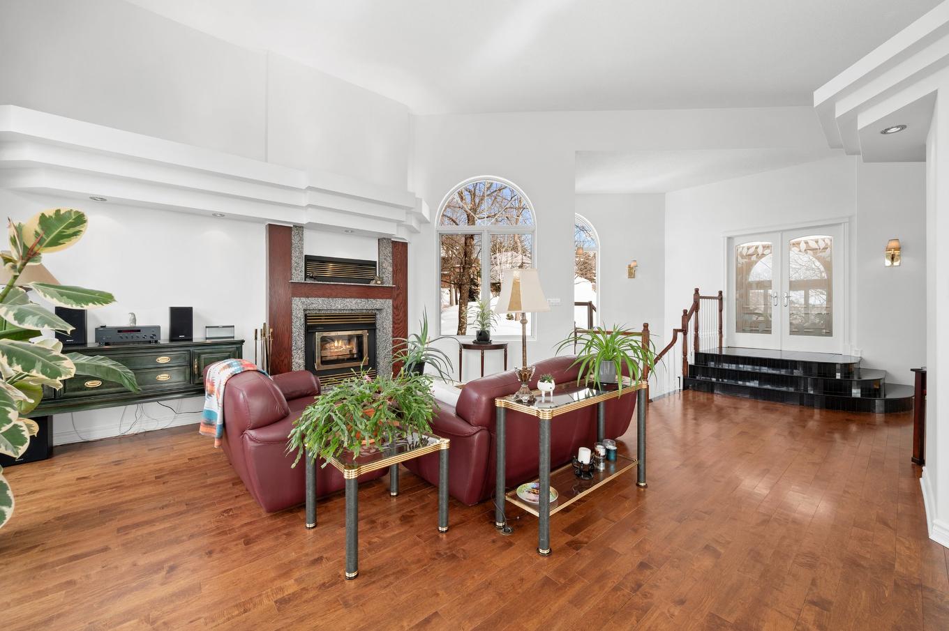 Living room - 1455 Rue Des Quatre-Saisons, Sainte-Adèle, QC - Indoor Photo Showing Living Room With Fireplace