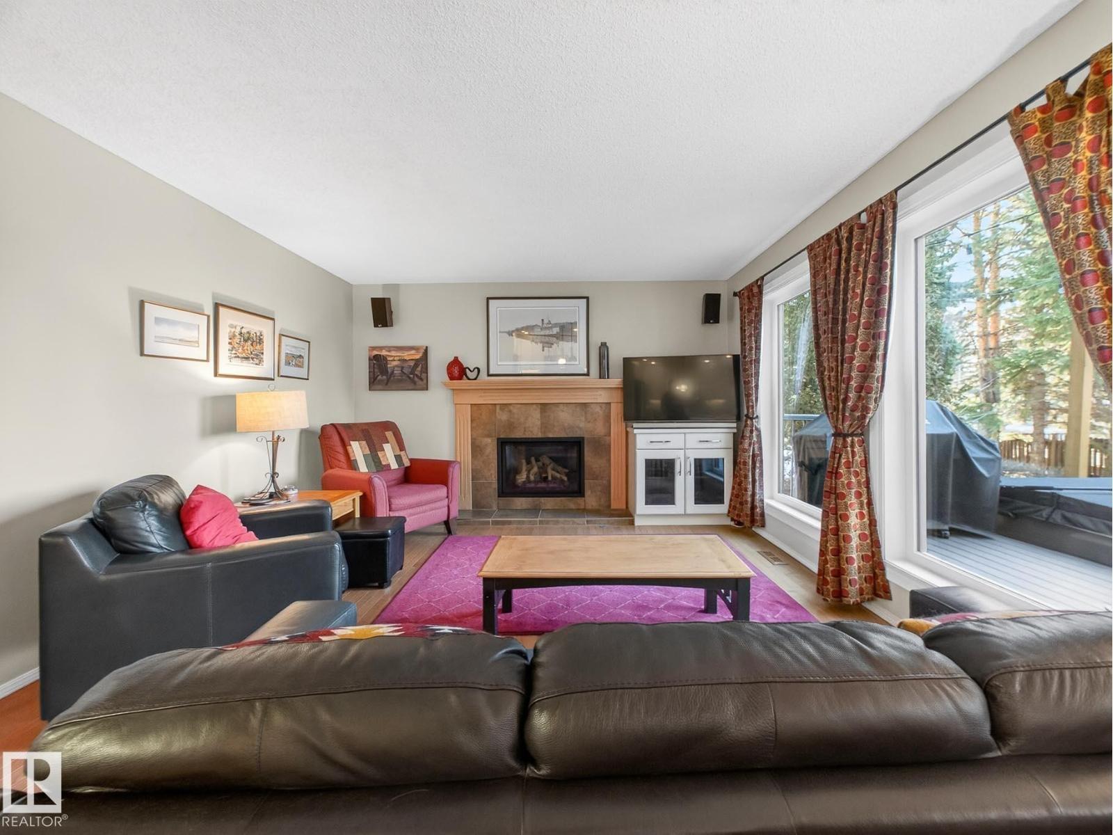 220 Ronning Cl Nw, Edmonton, AB - Indoor Photo Showing Living Room With Fireplace