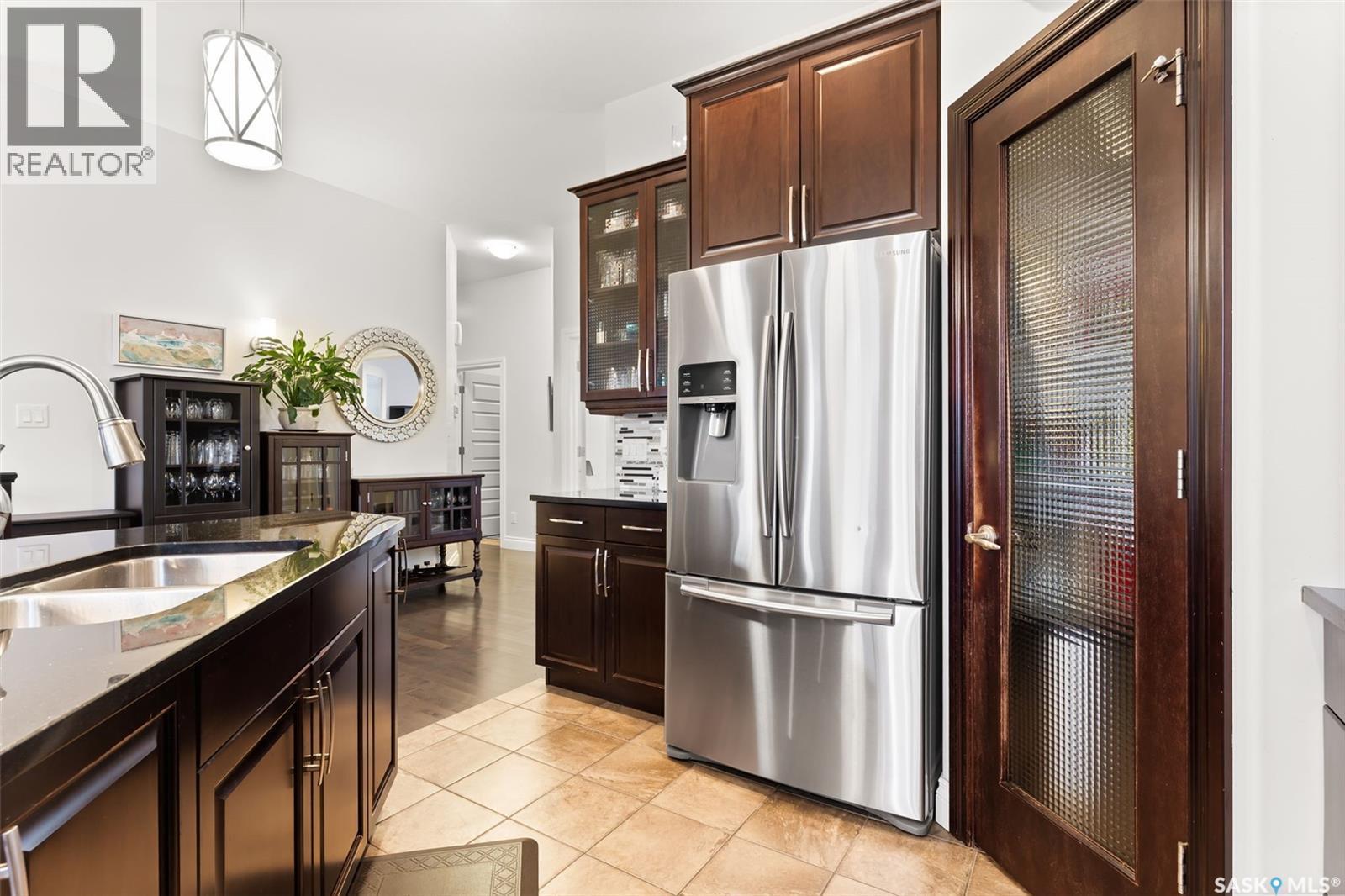 4613 Hames Crescent, Regina, SK - Indoor Photo Showing Kitchen With Stainless Steel Kitchen With Double Sink