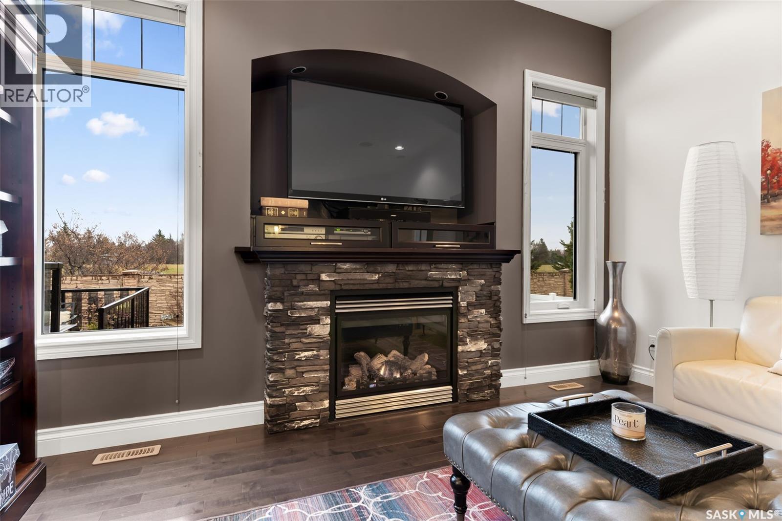 4613 Hames Crescent, Regina, SK - Indoor Photo Showing Living Room With Fireplace