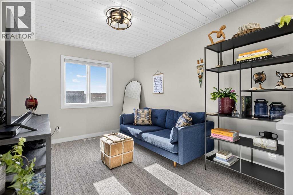 Family Room - 35 Wolf Hollow Park Se, Calgary, AB - Indoor Photo Showing Other Room