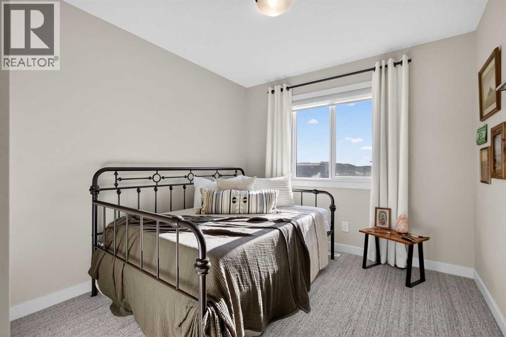 Bedroom - 35 Wolf Hollow Park Se, Calgary, AB - Indoor Photo Showing Bedroom