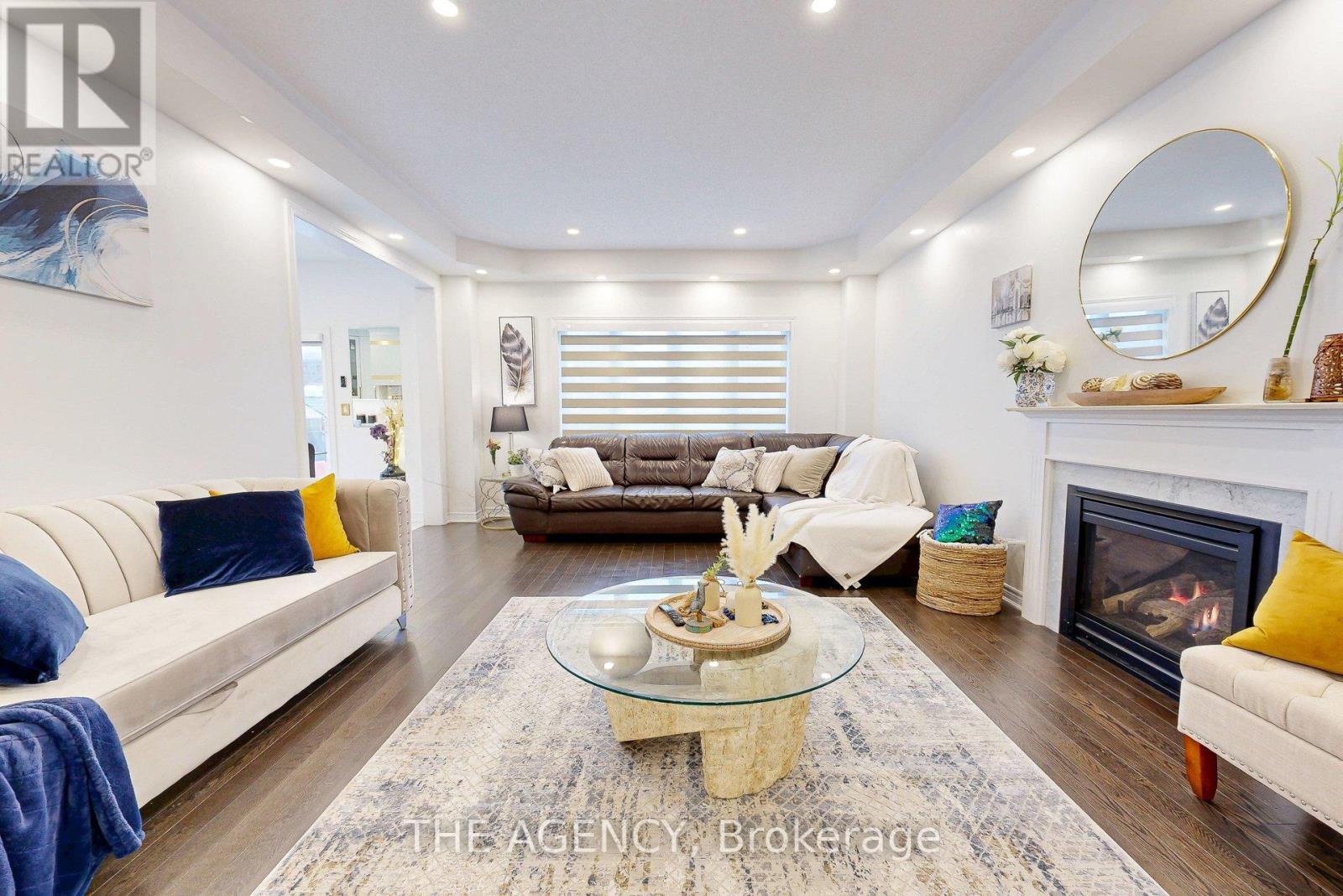 229 Andrews Trail, Milton, ON - Indoor Photo Showing Living Room With Fireplace