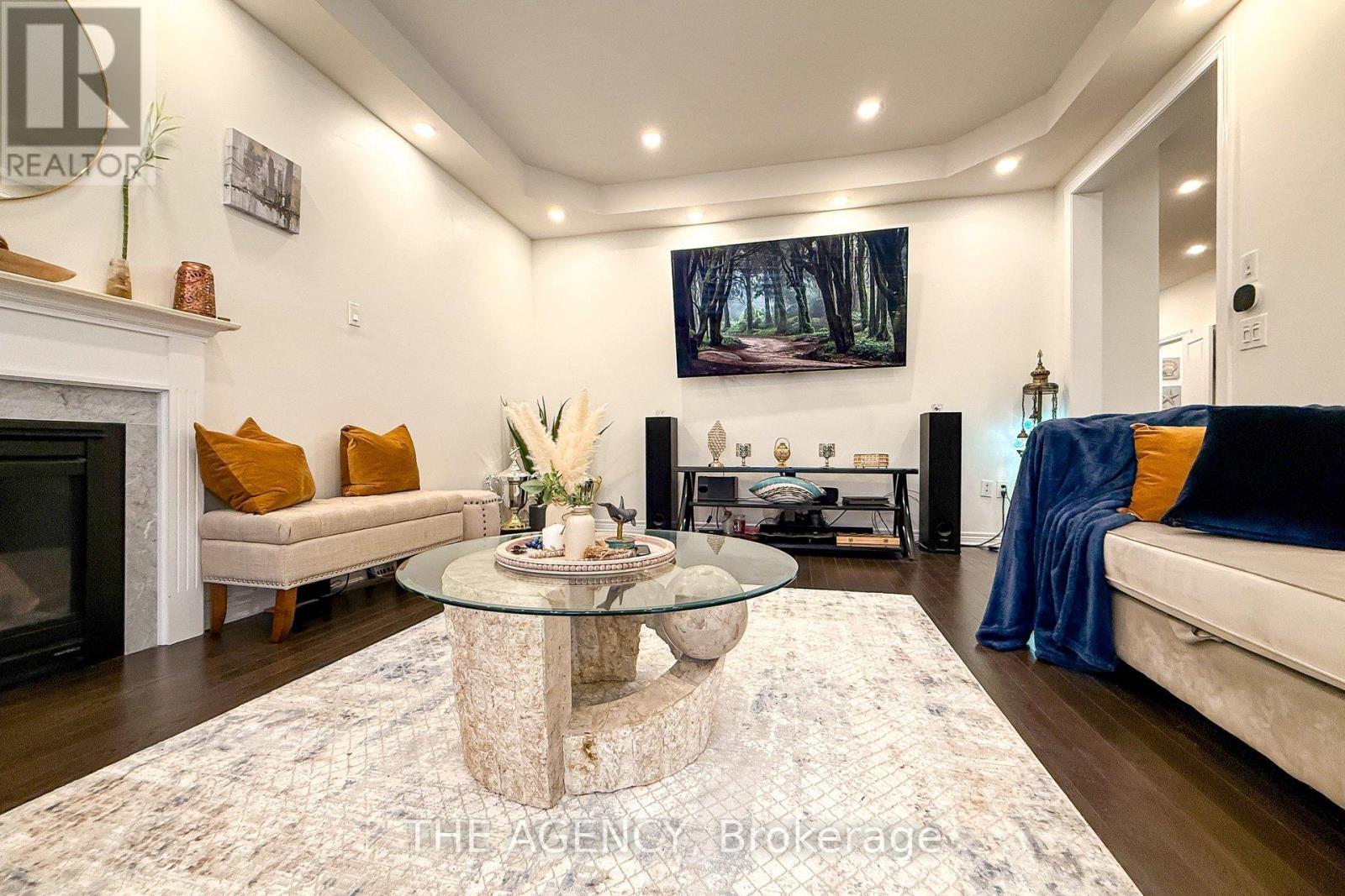 229 Andrews Trail, Milton, ON - Indoor Photo Showing Living Room With Fireplace