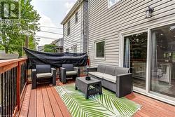 Wooden deck with outdoor lounge area -