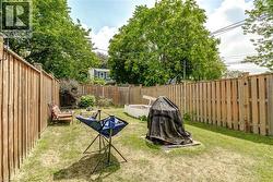View of fenced backyard -