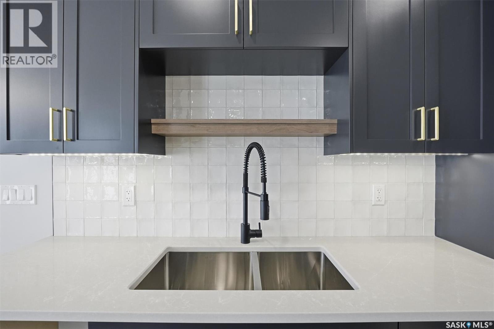 166 Cockroft Manor, Saskatoon, SK - Indoor Photo Showing Kitchen With Double Sink