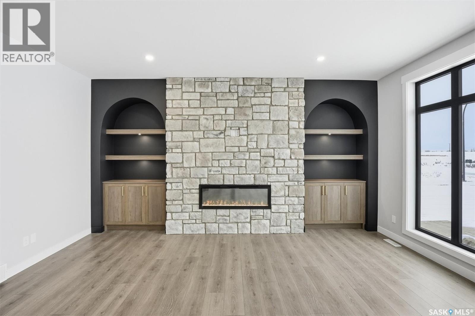 166 Cockroft Manor, Saskatoon, SK - Indoor With Fireplace