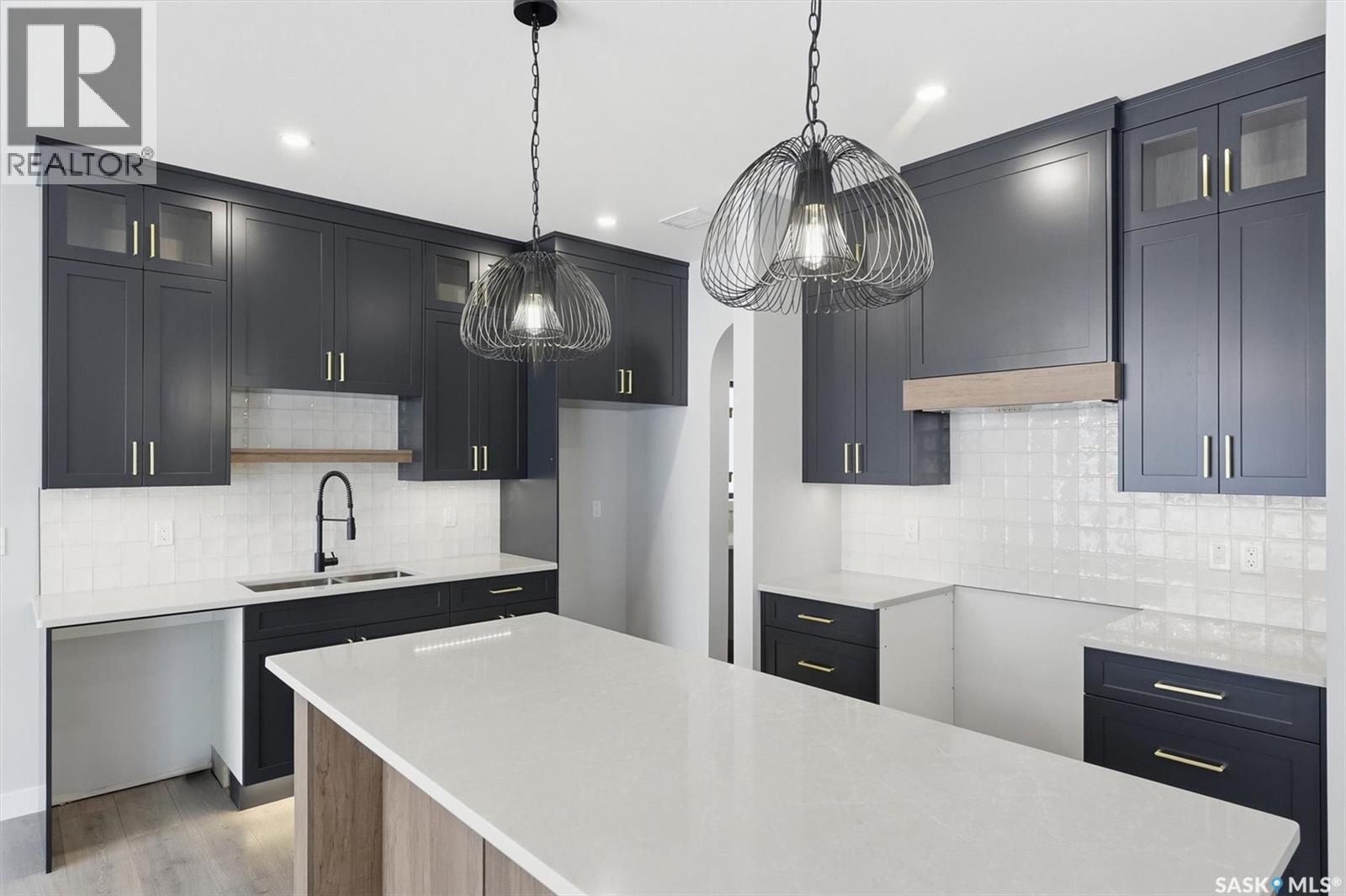 166 Cockroft Manor, Saskatoon, SK - Indoor Photo Showing Kitchen With Double Sink With Upgraded Kitchen