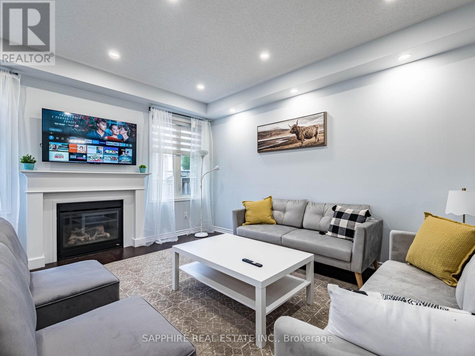 325 Trudeau Drive E, Milton, ON - Indoor Photo Showing Living Room With Fireplace