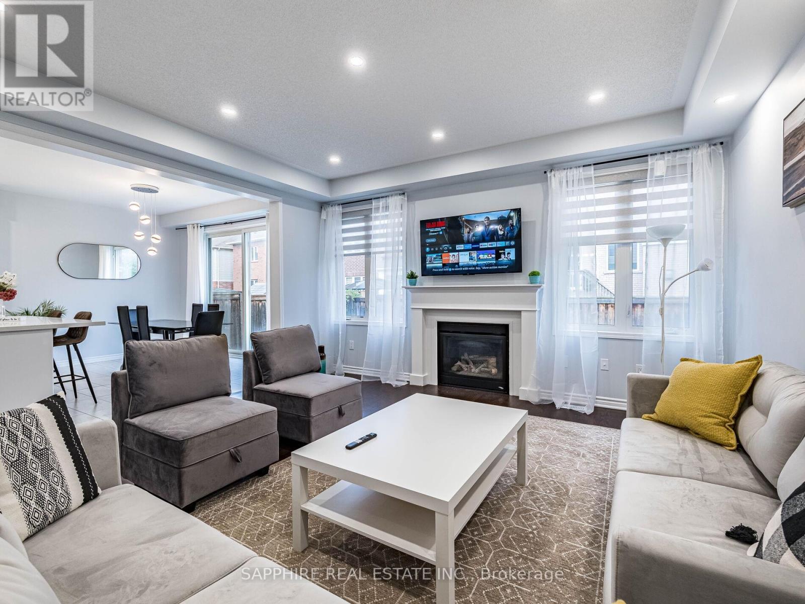 325 Trudeau Drive E, Milton, ON - Indoor Photo Showing Living Room With Fireplace