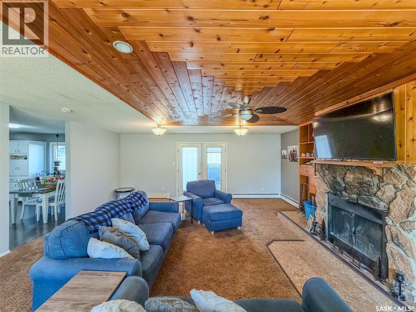 405 5Th Street E, Shaunavon, SK - Indoor Photo Showing Living Room With Fireplace