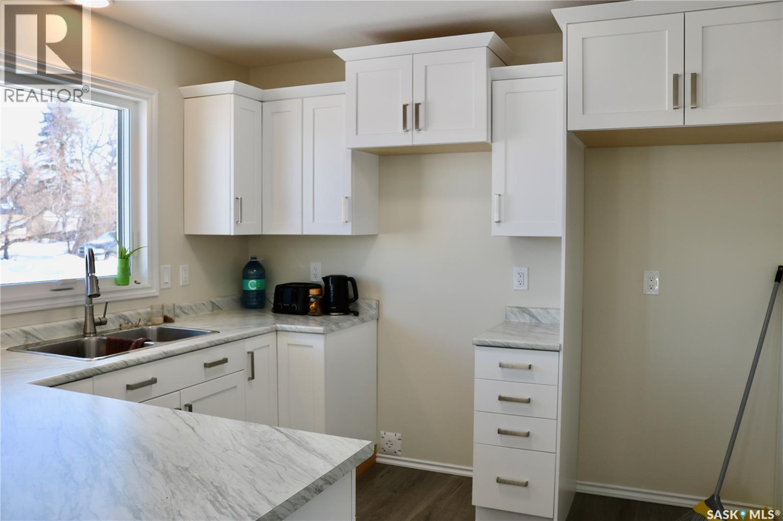 511 1St Avenue, Wapella, SK - Indoor Photo Showing Kitchen With Double Sink