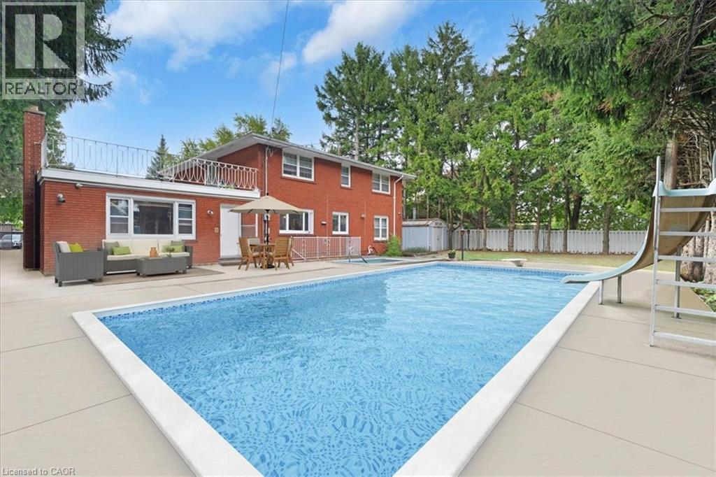 67 Elmhurst Drive, Hamilton, ON - Outdoor With In Ground Pool