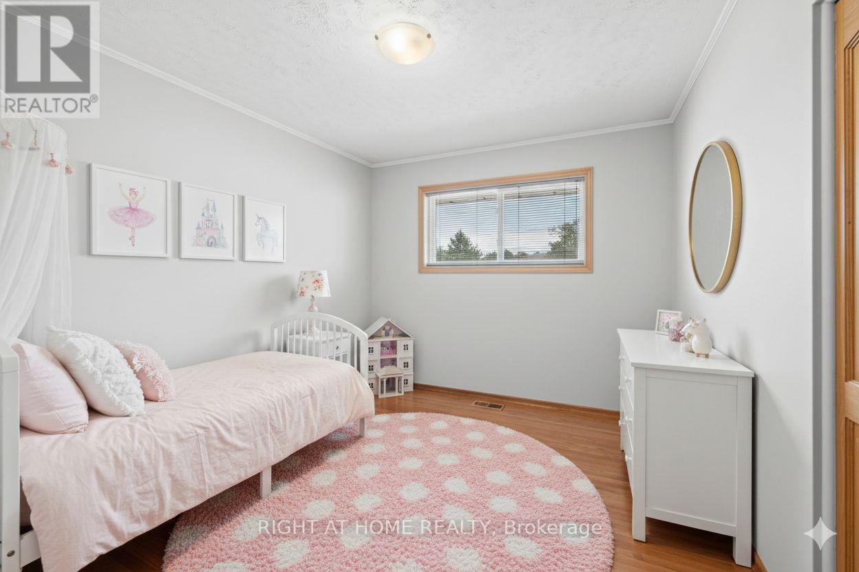 Bedroom virtually staged - 757 Dickens Avenue, Ottawa, ON - Indoor Photo Showing Bedroom