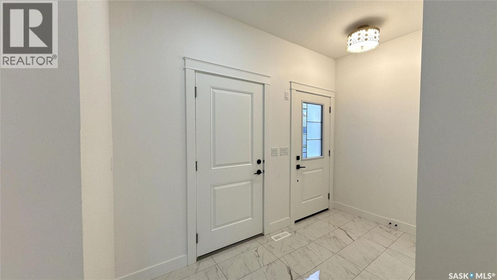 147 Woolf Bend, Saskatoon, SK - Indoor Photo Showing Other Room