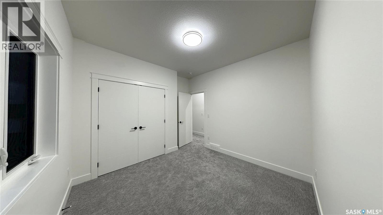 147 Woolf Bend, Saskatoon, SK - Indoor Photo Showing Other Room