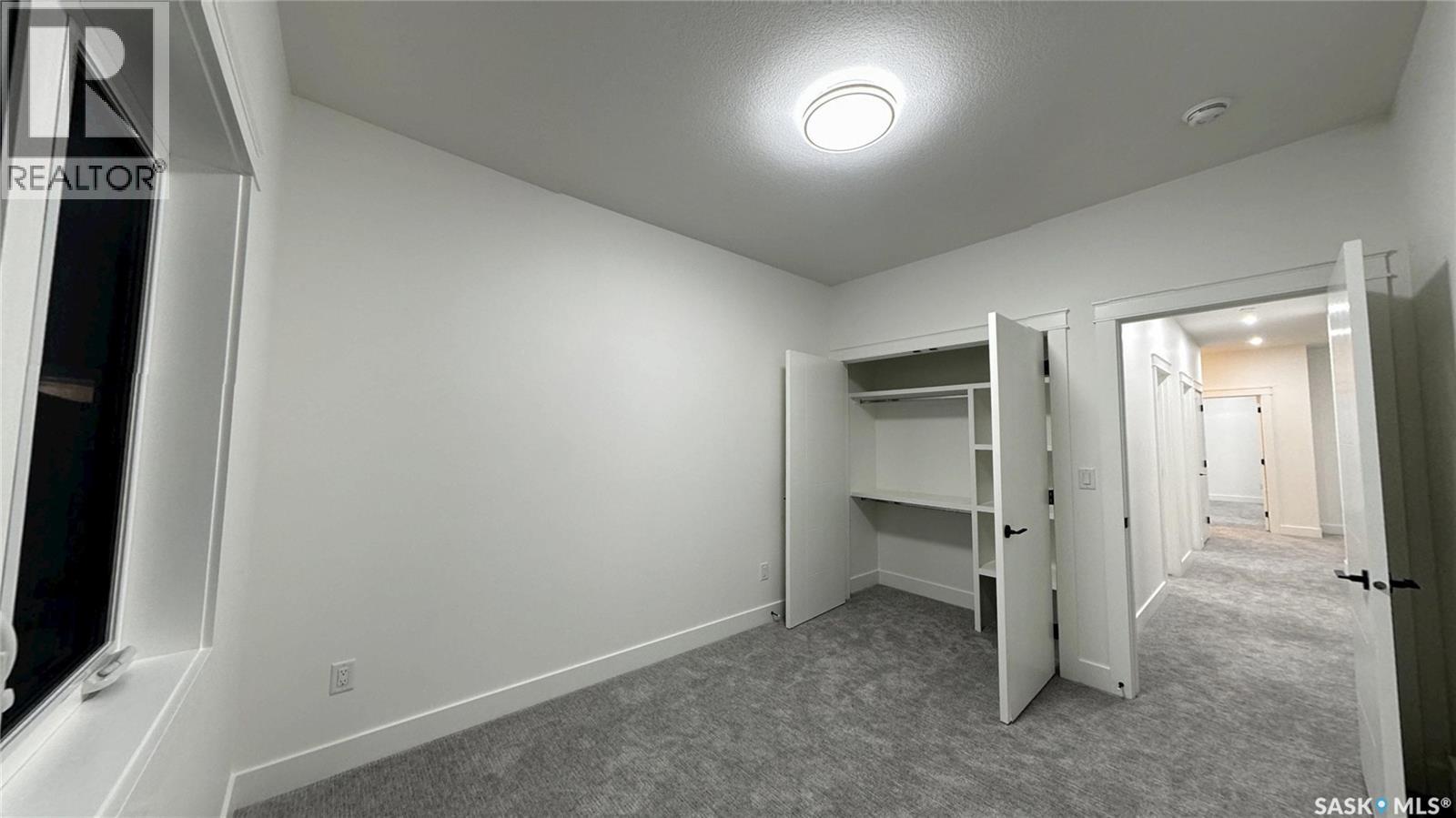 147 Woolf Bend, Saskatoon, SK - Indoor Photo Showing Other Room