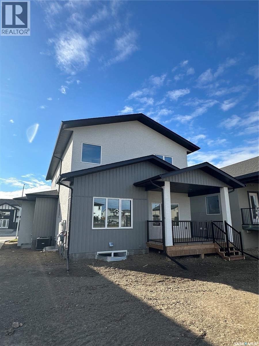 147 Woolf Bend, Saskatoon, SK - Outdoor With Deck Patio Veranda