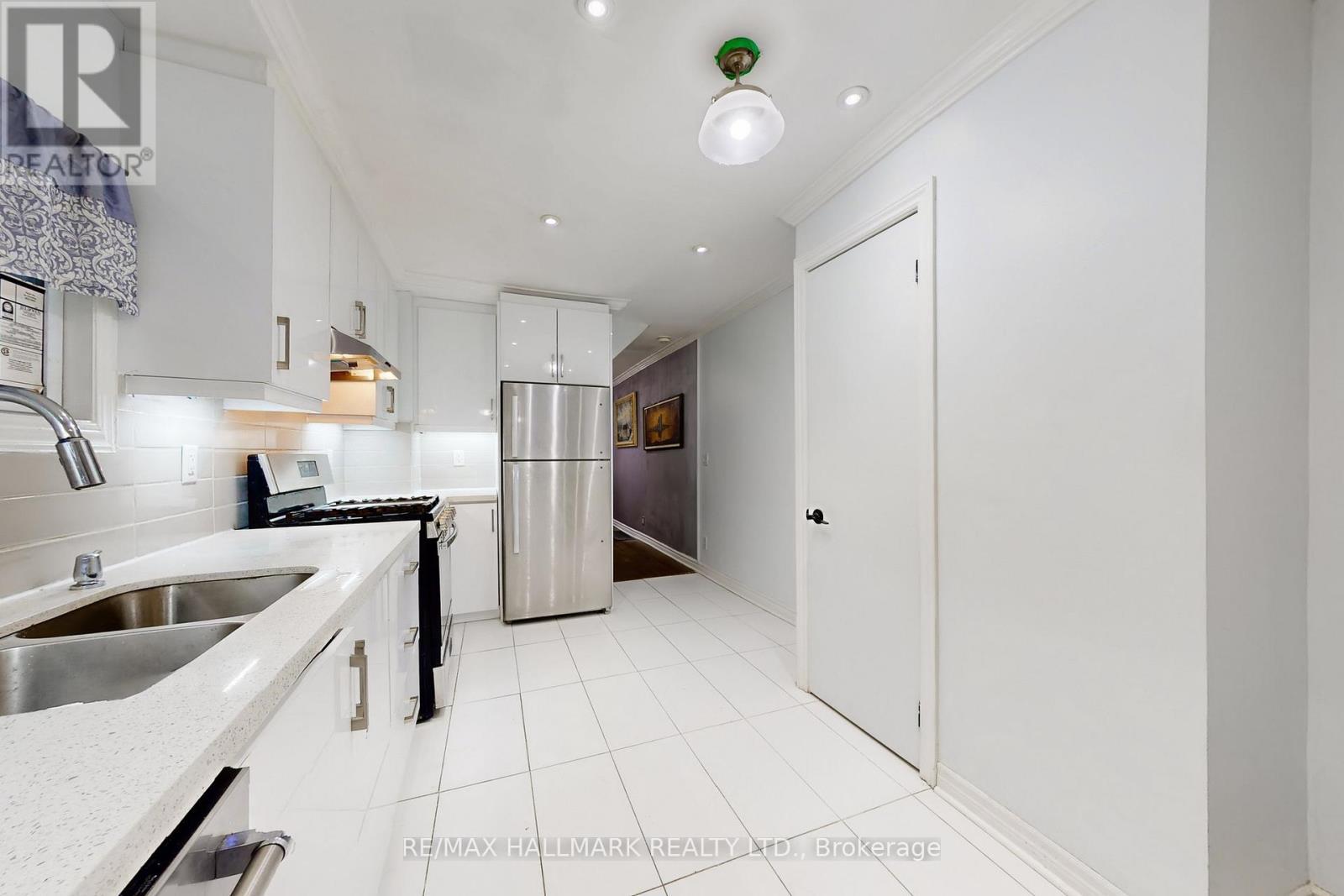 4 King Edward Avenue, Toronto, ON - Indoor Photo Showing Kitchen With Double Sink