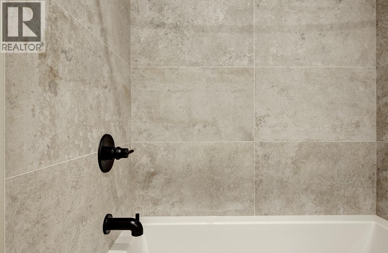 75 Predator Ridge Drive Unit# 205, Vernon, BC - Indoor Photo Showing Bathroom