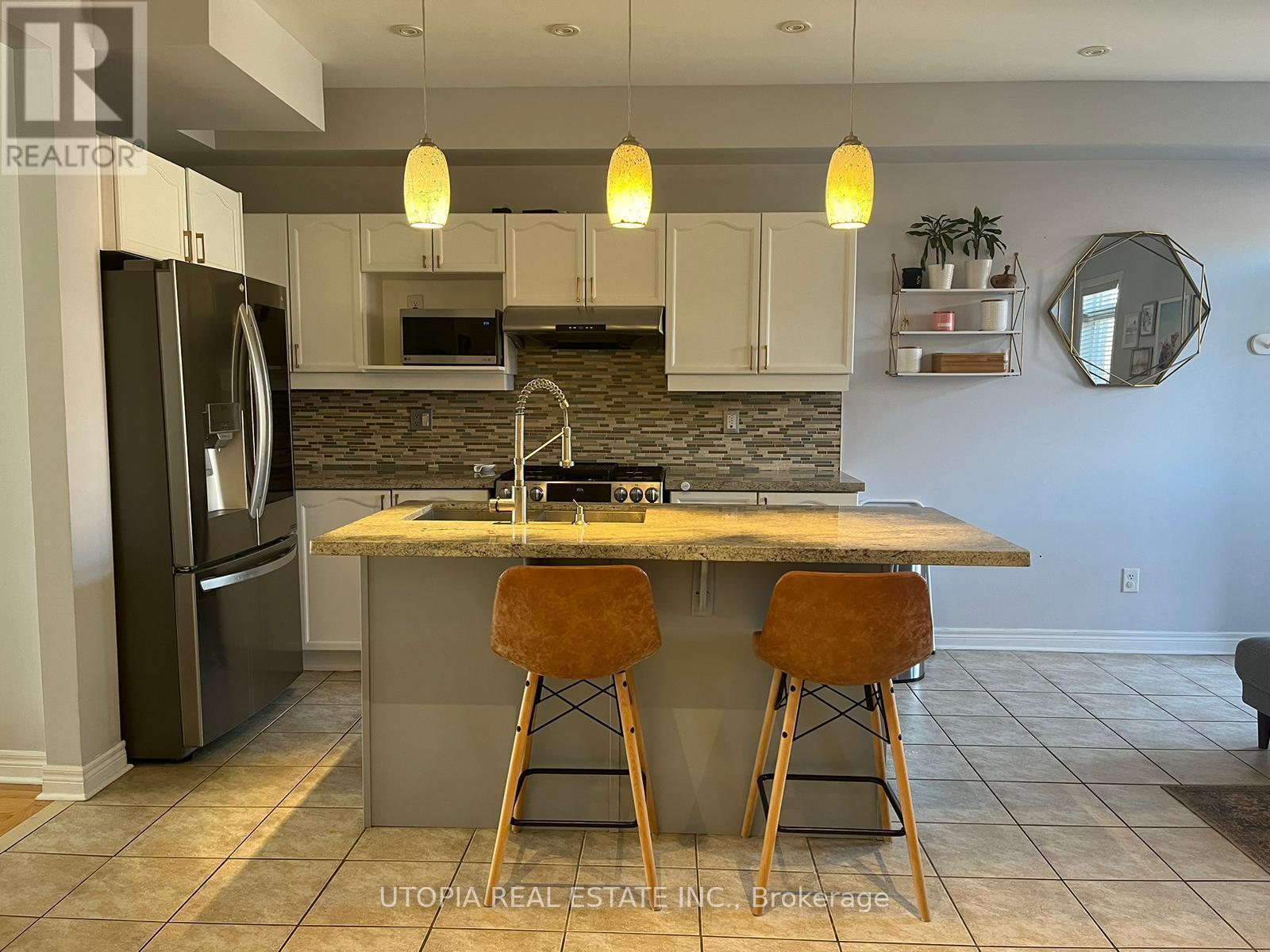 5405 Festival Drive, Mississauga, ON - Indoor Photo Showing Kitchen With Stainless Steel Kitchen With Double Sink