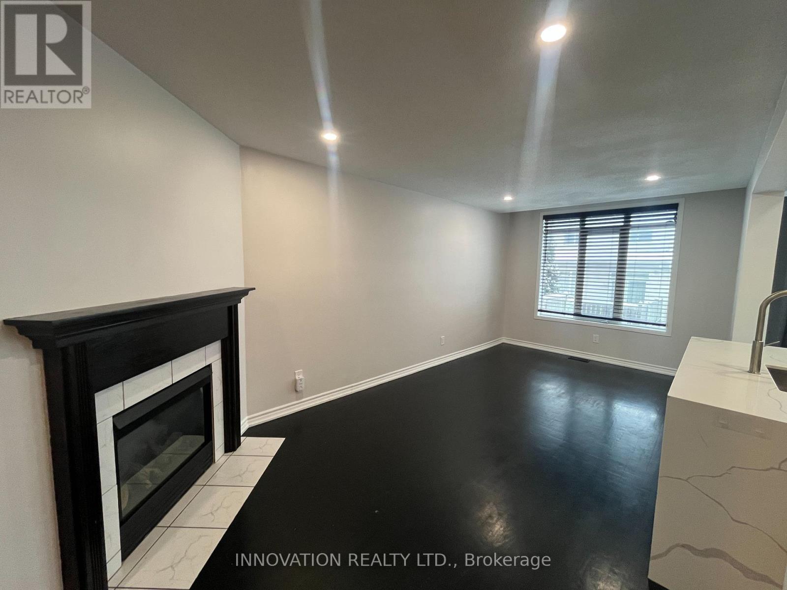 16 Santa Cruz Private, Ottawa, ON - Indoor Photo Showing Other Room With Fireplace