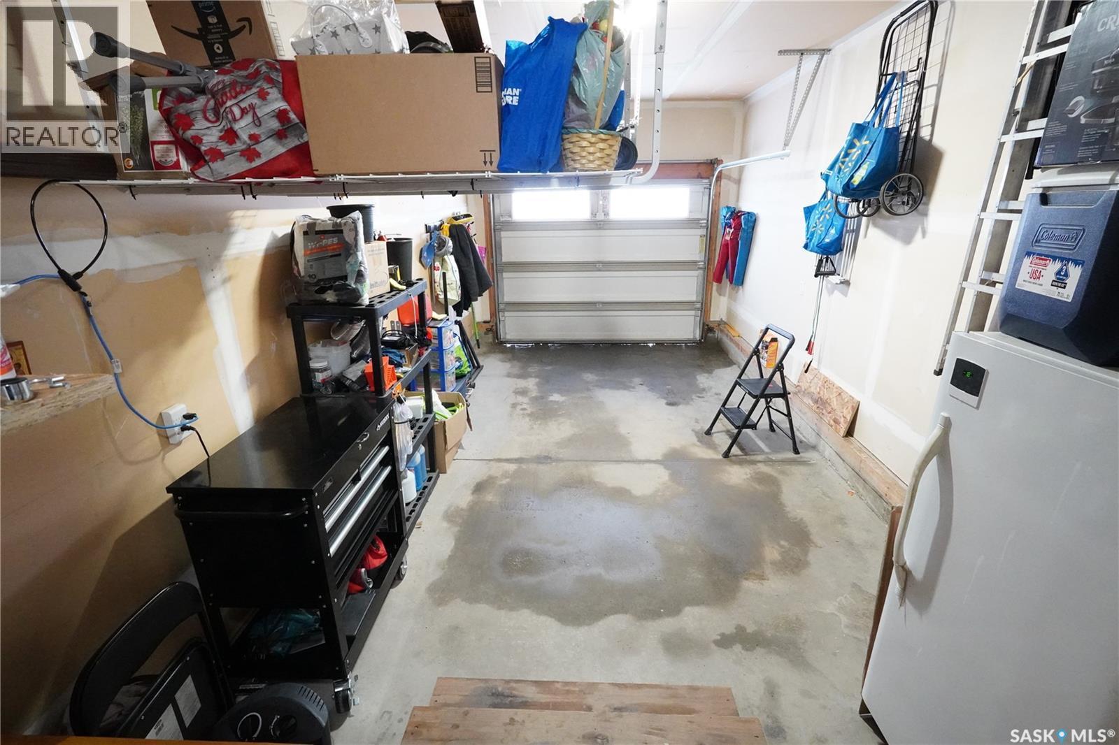 4514 Harbour Village Way, Regina, SK - Indoor Photo Showing Garage